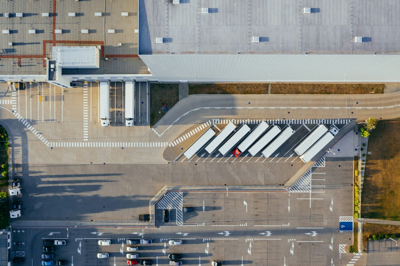 Aerial view of a distribution center loading dock with trucks